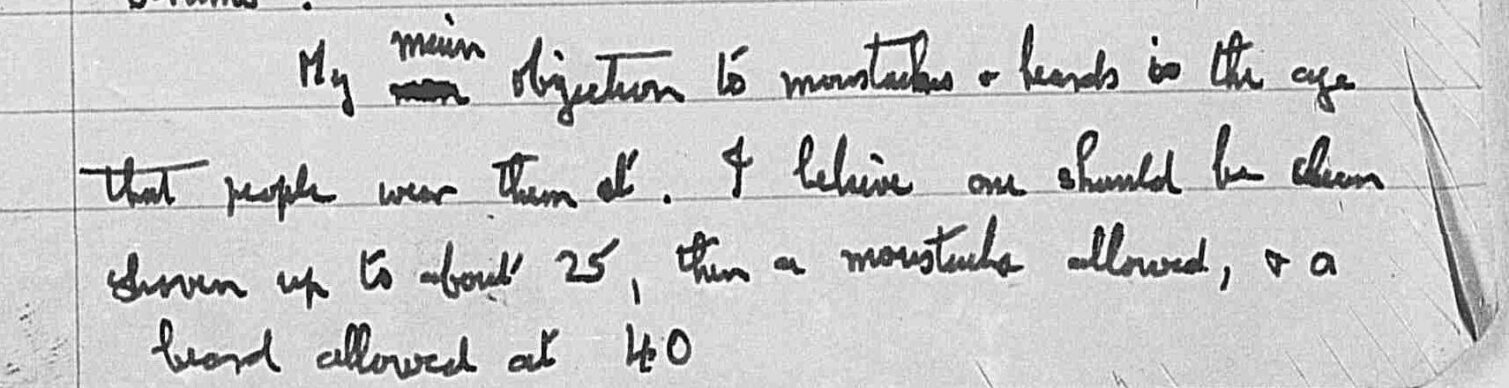 Handwritten notes discussing objections to monster or beard costumes, focusing on age appropriateness.