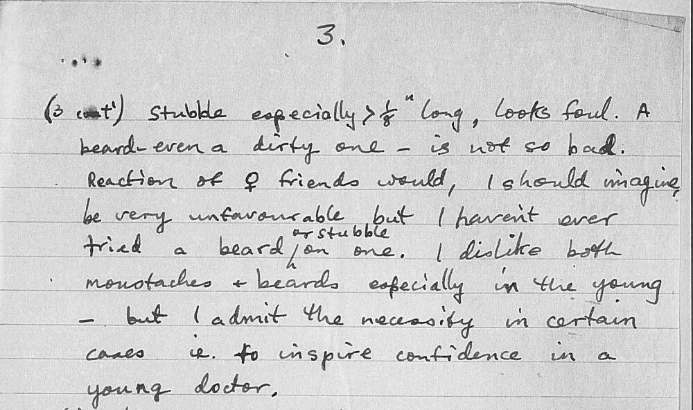 Handwritten notes discussing opinions on facial hair, including stubble, mustaches, and beards.